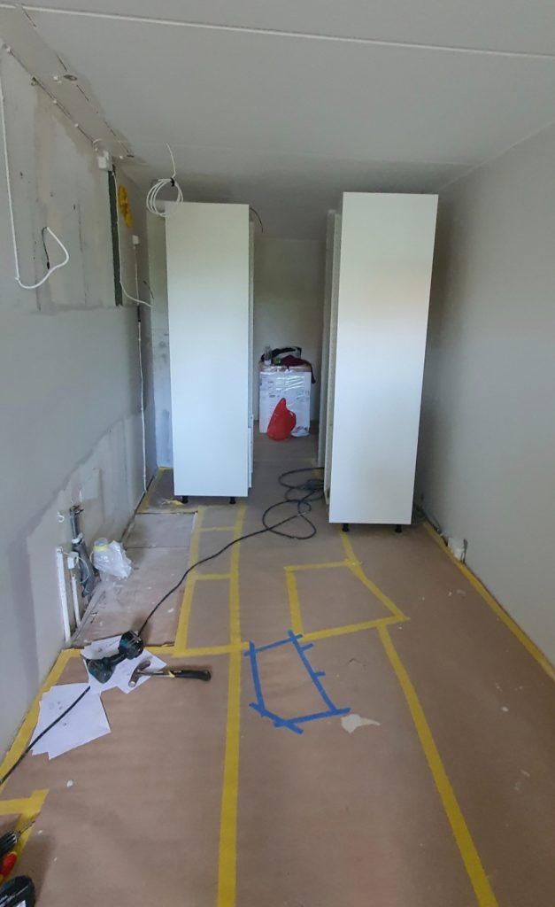 Köksmontering i Stockholm - Köksö byggd som en samlande mittpunkt i rummet.